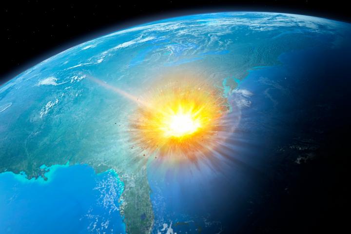Foto de archivo de una recreación de un meteorito cayendo en la Tierra.