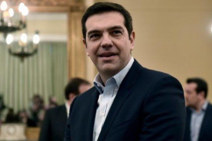 Syriza's leader Alexis Tsipras looks on as he is sworn in as Greek Prime Minister at the Presidential Palace in Athens on January 26, 2015. Tsipras' party took more than 36 percent of the vote in Sunday's general election, becoming the first ele...