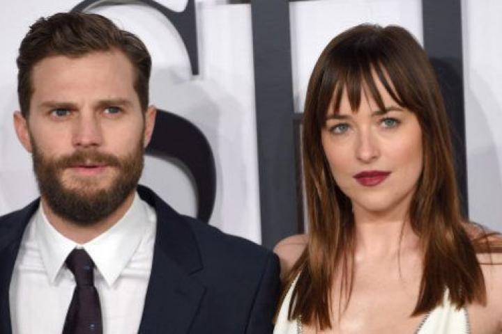 LONDON, ENGLAND - FEBRUARY 12:  Jamie Dornan and Dakota Johnson attend the UK Premiere of 'Fifty Shades Of Grey' at Odeon Leicester Square on February 12, 2015 in London, England.  (Photo by Karwai Tang/WireImage)