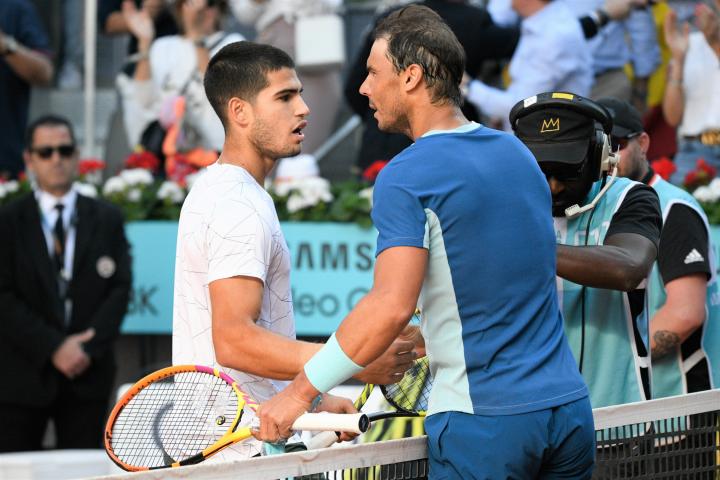 MADRID, SPAIN - MAY 06: Carlos Alcaraz greats Rafael Nadal during their match at the Mutua Madrid Open, on May 6, 2022, in Madrid, Spain. (Photo By Jose Oliva/Europa Press via Getty Images)