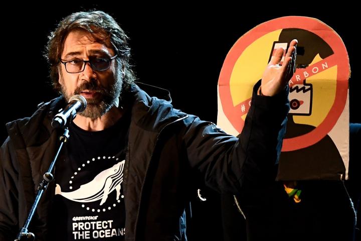 Spanish actor Javier Bardem speaks onstage during a mass climate march to demand urgent action on the climate crisis from world leaders attending the COP25 summit, in Madrid, on December 6, 2019. - The main march takes place in Madrid on the sid...