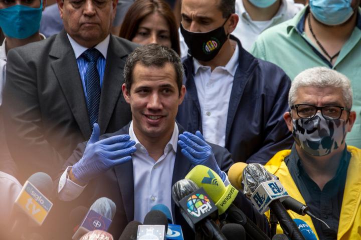 Venezuelan opposition leader Juan Guaido delivers a press conference at the headquarters of the Accion Democratica (Democratic Action) party in Caracas on June 17, 2020. Juan Guaido accused the government of trying to manipulate the upcoming ele...