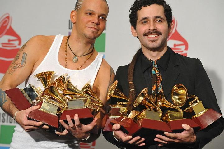 Puerto Rican duo Calle 13, Rene Perez (L) and Eduardo Cabra (R), pose in the press room after winning 10 Latin Grammy Awards, at the 2009 Latin Grammy Awards in Las Vegas, NV on November 5, 2009.    AFP PHOTO / Robyn Beck (Photo credit should read ROBYN BECK/AFP via Getty Images)