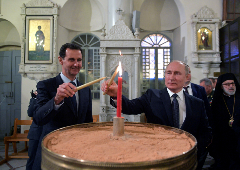 Vladimir Putin y Bachar al Assad, en la Catedral Ortodoxa de Damasco, en enero de 2020.
