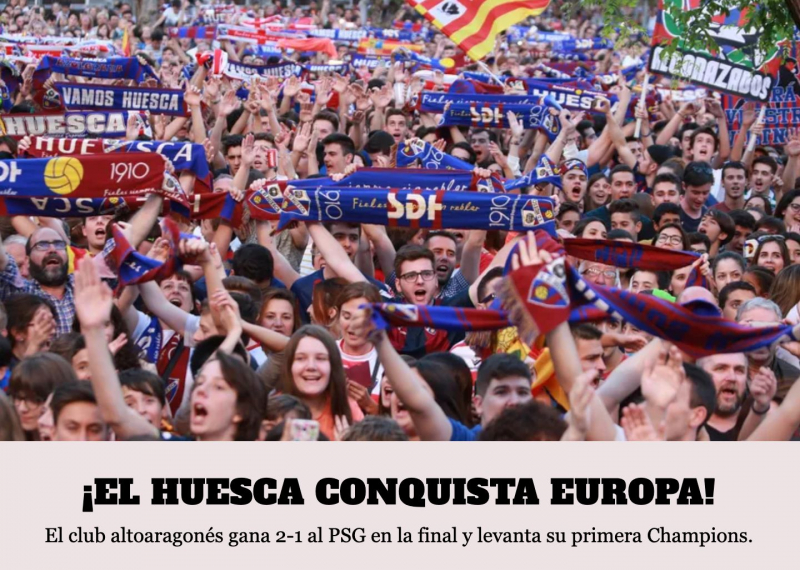 Aficionados del Huesca celebran el éxito de su equipo.